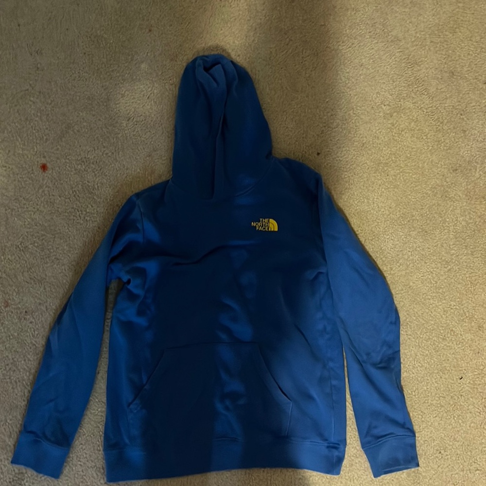 blue,orange, yellow, and black north face sweatshirt size kids XL